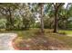 Expansive backyard with mature trees and fencing at 7545 Ne 58Th Ave, Anthony, FL 32617