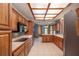 Kitchen with wood cabinets, a breakfast nook, and stainless steel appliances at 7545 Ne 58Th Ave, Anthony, FL 32617