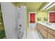 Bathroom features a shower/tub combo and updated vanity at 5311 Se 15Th Ct, Ocala, FL 34480