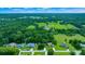Aerial view of house and neighborhood, showing surrounding landscape at 5311 Se 15Th Ct, Ocala, FL 34480