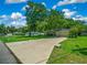Single-story house with attached garage and a long driveway at 5311 Se 15Th Ct, Ocala, FL 34480