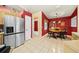 Bright kitchen with stainless steel appliances and adjacent dining area at 5311 Se 15Th Ct, Ocala, FL 34480