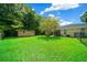 Large backyard with storage shed and privacy fence at 5311 Se 15Th Ct, Ocala, FL 34480