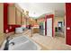 Clean kitchen with double sink and stainless steel refrigerator at 5311 Se 15Th Ct, Ocala, FL 34480