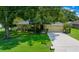 Single-story house with attached garage and a nicely landscaped yard at 5311 Se 15Th Ct, Ocala, FL 34480