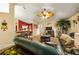 Bright and airy living room with ample seating and views into the dining area at 5311 Se 15Th Ct, Ocala, FL 34480