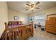 Cozy bedroom with a double bed and built-in shelving at 5311 Se 15Th Ct, Ocala, FL 34480