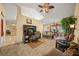 Open living space with plush seating, coffee table, and desk at 5311 Se 15Th Ct, Ocala, FL 34480