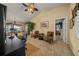 Living room with comfortable seating and a home office area at 5311 Se 15Th Ct, Ocala, FL 34480