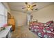 Charming bedroom with a twin bed and plenty of storage at 5311 Se 15Th Ct, Ocala, FL 34480