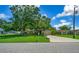 House exterior showcasing driveway and landscaping at 5311 Se 15Th Ct, Ocala, FL 34480