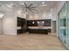Spacious kitchen with large island and dark cabinetry at 7578 Nw 33Rd Pl, Ocala, FL 34482