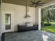 Outdoor kitchen with stainless steel appliances and granite countertops at 7578 Nw 33Rd Pl, Ocala, FL 34482