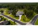 Luxury home with driveway and landscaped lawn at 7578 Nw 33Rd Pl, Ocala, FL 34482