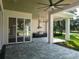 Covered patio with paver stone floor and view of golf course at 7578 Nw 33Rd Pl, Ocala, FL 34482