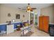 Home office with wood cabinet and decorative elements at 3967 Se 99Th St, Belleview, FL 34420