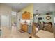 Open kitchen with granite countertops and stainless steel dishwasher at 3967 Se 99Th St, Belleview, FL 34420