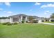 Well maintained home with a spacious front yard and driveway at 3967 Se 99Th St, Belleview, FL 34420