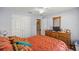Bedroom with a queen bed and built-in dresser at 3967 Se 99Th St, Belleview, FL 34420