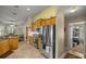 Kitchen boasts stainless steel appliances and light wood cabinets at 3967 Se 99Th St, Belleview, FL 34420