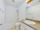 Bathroom with shower/tub combo and vanity at 16361 Se 87Th Ave, Summerfield, FL 34491