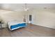 Spacious bedroom with large bed and ensuite bathroom access at 10 Se Chinica Drive, Summerfield, FL 34491
