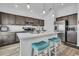 Modern kitchen with stainless steel appliances and island at 1789 Usrey Ct, The Villages, FL 34762