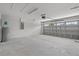 Attached garage with ample space and overhead storage at 7128 Sw 134Th St, Ocala, FL 34473