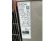 Outdoor air conditioning unit information label at 6690 Cherry Rd, Ocala, FL 34472