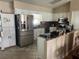 Kitchen with stainless steel appliances and ample cabinetry at 6690 Cherry Rd, Ocala, FL 34472