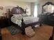 Large main bedroom with a king-size bed and ensuite bath at 6690 Cherry Rd, Ocala, FL 34472