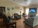 Spacious living room with hardwood floors and fireplace at 6690 Cherry Rd, Ocala, FL 34472