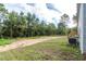 Manufactured home with large backyard and wooded area at 16231 Sw 20Th Ln, Ocala, FL 34481