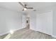 Spacious bedroom with double-door closet and wood-look floors at 13625 Sw 107 Pl, Dunnellon, FL 34432