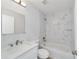 Bathroom with marble shower/tub combo and modern vanity at 13625 Sw 107 Pl, Dunnellon, FL 34432