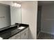 Modern bathroom with granite countertop and walk-in shower at 7088 Sw 179Th Court Rd, Dunnellon, FL 34432