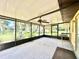 Screened porch overlooking the backyard at 26 Juniper Pass Ln, Ocala, FL 34480