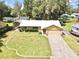 Aerial view of house, yard, and driveway at 26 Juniper Pass Ln, Ocala, FL 34480