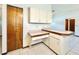 Kitchen features an island with additional counter space at 26 Juniper Pass Ln, Ocala, FL 34480