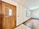 Inviting entryway with hardwood floors and a wood door with glass accents at 26 Juniper Pass Ln, Ocala, FL 34480
