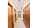 Bright entryway with wood doors and tile flooring at 26 Juniper Pass Ln, Ocala, FL 34480