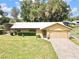 House exterior with stone accents and metal roof at 26 Juniper Pass Ln, Ocala, FL 34480
