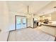 Dining room with tiled floors and a crystal chandelier at 26 Juniper Pass Ln, Ocala, FL 34480