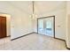 Dining room with tiled floors and a crystal chandelier at 26 Juniper Pass Ln, Ocala, FL 34480