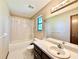 Clean bathroom with shower/tub combo and vanity at 26 Juniper Pass Ln, Ocala, FL 34480