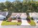 Aerial view of a residential neighborhood with houses and lush green spaces at 11696 Sw 71St Cir, Ocala, FL 34476