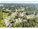 Aerial view of a large community with houses and trees at 11696 Sw 71St Cir, Ocala, FL 34476