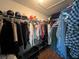 Large walk-in closet with ample hanging space and shelving at 10716 Sw 53Rd Cir, Ocala, FL 34476