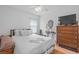 Bedroom with a queen-size bed, dresser, and TV at 10716 Sw 53Rd Cir, Ocala, FL 34476