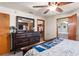 Main bedroom with dresser, walk-in closet, and ensuite bathroom at 174 Juniper Trl, Ocala, FL 34480
